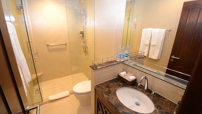 Cabins on the Avalon Myanmar feature spacious, contemporary bathrooms with marble-topped sinks.