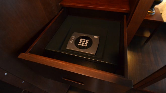 Personal safes big enough to hold a laptop are located in cabin closets.