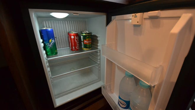 Miniature refrigerators in cabins are stocked with bottled water, sodas and local Myanmar beer that are complimentary and restocked daily.
