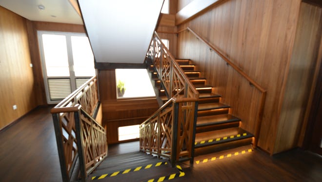 A lovely teak wood stairway connects the Avalon Myanmar's three decks.