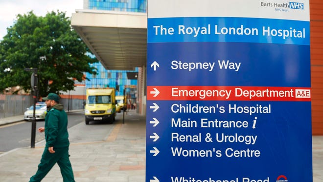 Signage is seen outside The Royal London Hospital in London on May 14, 2017, which was among places hit by a global cyberattack.