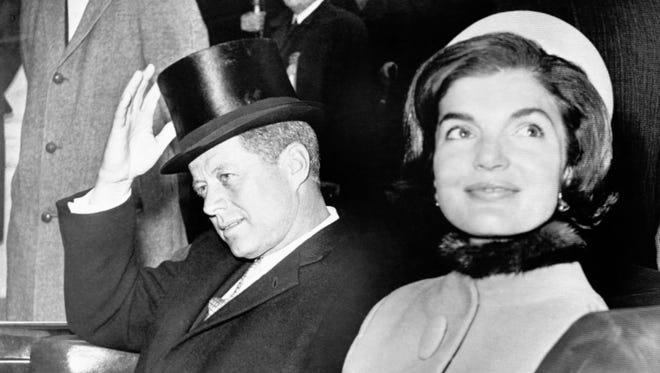 Kennedy and his wife, Jacqueline, leave the Capitol on Jan. 20, 1961, after he took the oath of office.