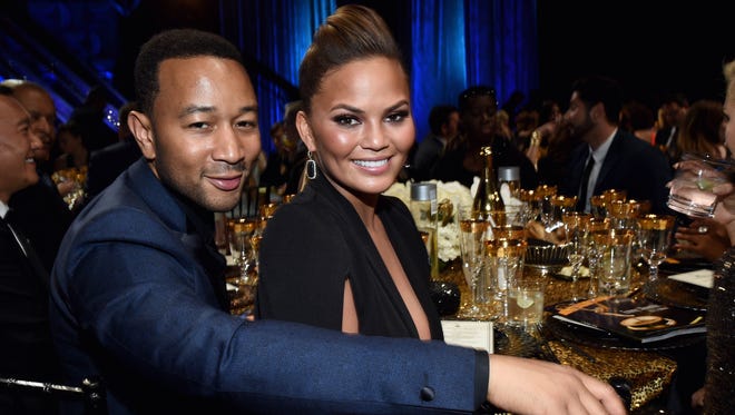 BURBANK, CA - APRIL 26:   Recording artist John Legend (L) and model Chrissy Teigen attend The 42nd Annual Daytime Emmy Awards at Warner Bros. Studios on April 26, 2015 in Burbank, California.  (Photo by Michael Buckner/Getty Images for NATAS) ORG XMIT: 549896693 ORIG FILE ID: 471277760