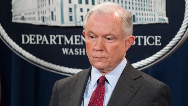 Attorney General Jeff Sessions waits to speak to the media  at the Department of Justice on July 20, 2017.