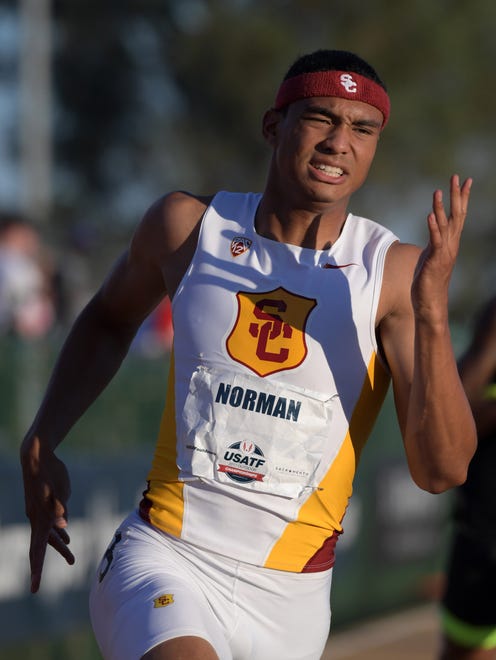 Michael Norman of Southern California advances to the final in the 400.