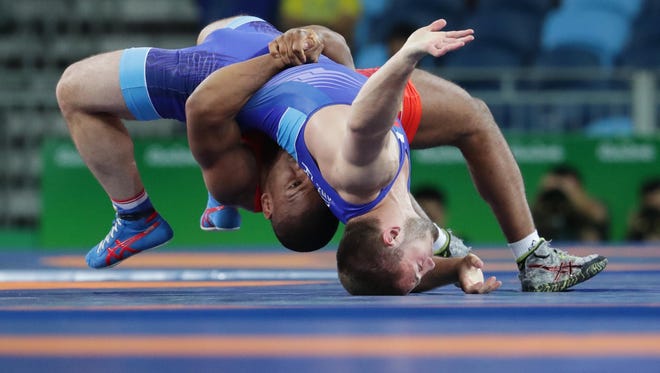 Davit Chakvetadze (RUS) competes against Zhan Beleniuk (UKR) during the men's 85kg Greco-Roman wrestling gold medal match in the Rio 2016 Summer Olympic Games at Carioca Arena 2.