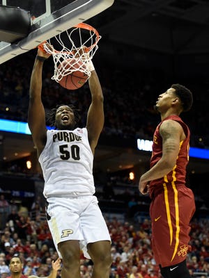 Purdue Boilermakers forward Caleb Swanigan (50) dunks the ball during the second half of the game against the Iowa State Cyclones in the second round of the 2017 NCAA Tournament at BMO Harris Bradley Center.