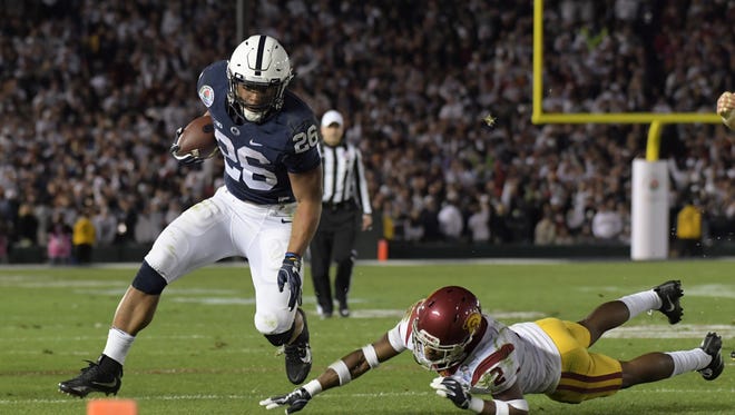 Penn State's Saquon Barkley out runs Southern California defensive back Adoree' Jackson during the 2017 Rose Bowl.