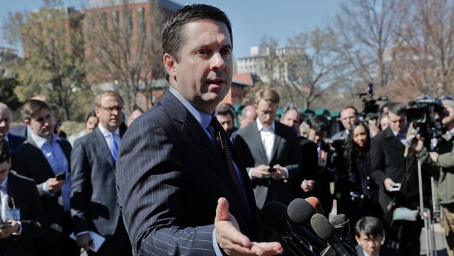 In this March 22, 2017 file photo, House Intelligence Chairman Devin Nunes, R-Calif, speaks with reporters outside the White House.