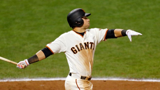 Game 3 in San Francisco: Giants second baseman Joe Panik hits a walk-off RBI double in the 13th inning.