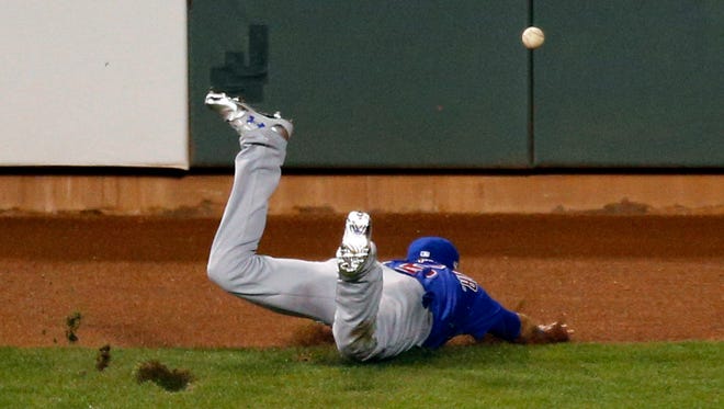 Game 3 in San Francisco: Cubs center fielder Albert Almora Jr. can't make a catch in the eighth inning.
