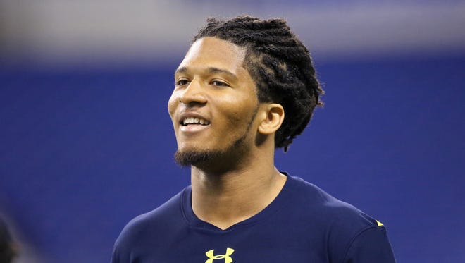 Washington defensive back Sidney Jones is seen before a drill at the 2017 NFL football scouting combine Monday, March 6, 2017, in Indianapolis.