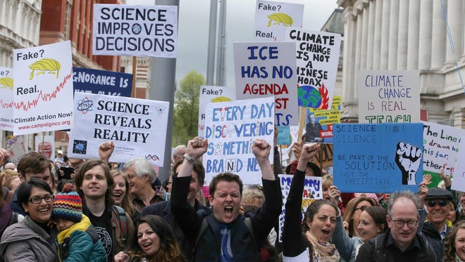 Participants gather prior to the start of the March for Science in London on April 22, 2017. People across the globe are taking part in the March for Science to recognize scientific progress, raise awareness of scientific discovery, and defend scientific integrity.