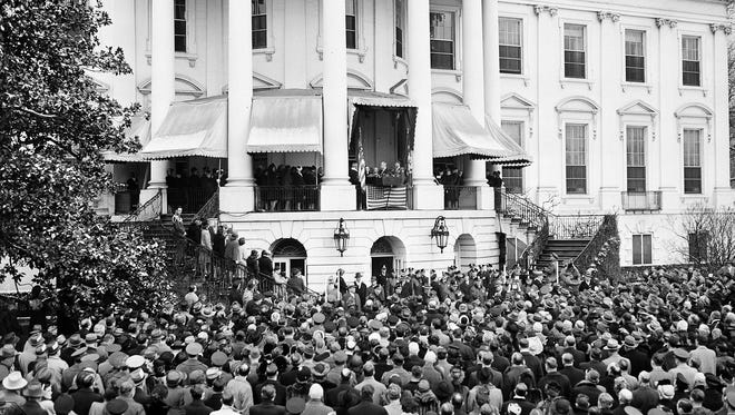 Roosevelt takes the oath of office for his fourth term during inaugural ceremonies on the rear porch of the White House on Jan. 20, 1945.