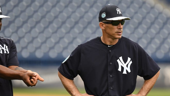 Joe Girardi says  baseball could operate the same way as NFL assistant coaches in the press box do.