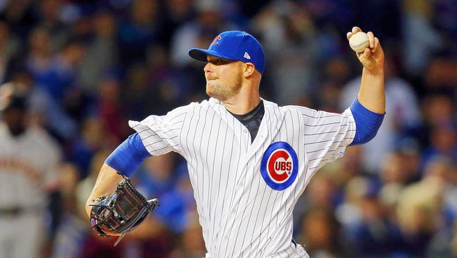 Game 1 in Chicago: Cubs starting pitcher Jon Lester pitches during the first inning.