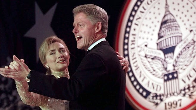 The Clintons dance at the New England Ball on Jan. 20, 1997, in Washington.