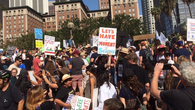 Demonstrators gather for the March for Science at Pershing Square in Los Angeles.