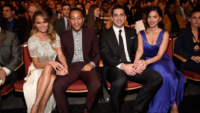 (L-R) Model Chrissy Teigen, recording artist John Legend, NFL player Aaron Rodgers, and actress Olivia Munn attend the 4th Annual NFL Honors at Phoenix Convention Center on January 31, 2015 in Phoenix, Arizona.