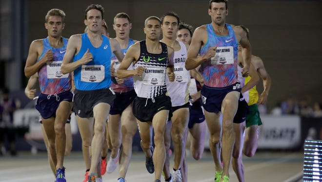 Matthew Centrowitz in a crowd in the first round of the 1,500.