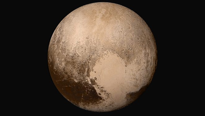 Four images from New Horizons’ Long Range Reconnaissance Imager (LORRI) were combined with color data from the Ralph instrument to create this sharper global view of Pluto.