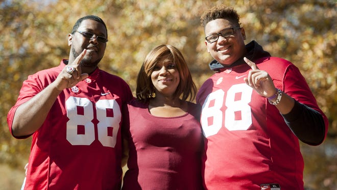 Mickey Welsh/Advertiser
The family of O.J. Howard, from left, Kareem Howard, Lamesa Parker-Howard and KJ Howard, pose for a photo before the Iron Bowl at Bryant-Denny Stadium in Tuscaloosa on Saturday.
The family of OJ Howard, from left, Kareem Howard, Lamesa Parker Howard and KJ Howard before the Iron Bowl at Bryant Denny Stadium in Tuscaloosa, Ala. on Saturday November 26, 2016. (Mickey Welsh / Montgomery Advertiser)
