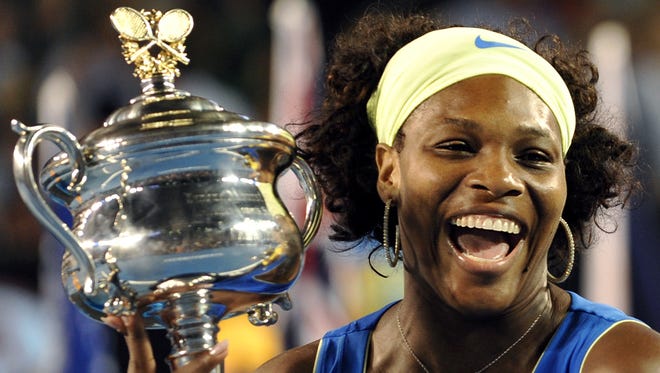Serena Wiliams celebrates after defeating Dinara Safina of Russia in the 2009 Australian Open women's singles final match.