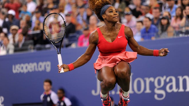 Serena Williams celebrates after defeating Victoria Azarenka in the 2013 U.S Open women's singles final.
