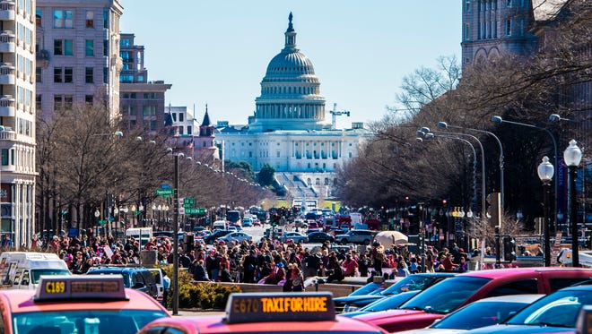 A few hundred people gather in Washington to mark International Womens Day.