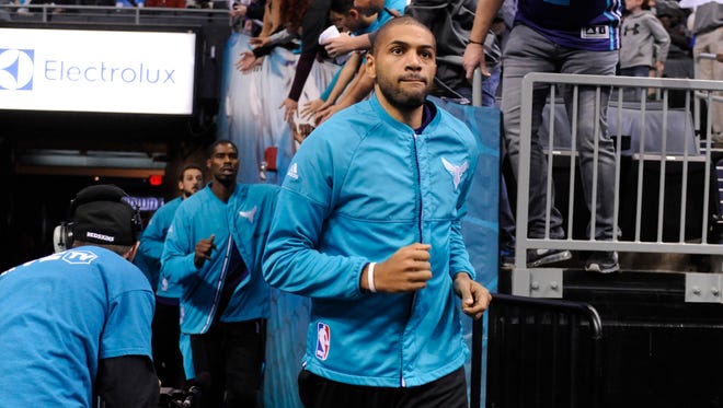 Charlotte Hornets guard forward Nicolas Batum (5) enters the arena prior to the game against the San Antonio Spurs at the Spectrum Center.
