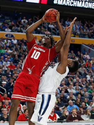 Wisconsin Badgers forward Nigel Hayes (10) shoots over Villanova Wildcats forward Kris Jenkins (2) in the second half during the second round of the 2017 NCAA Tournament.