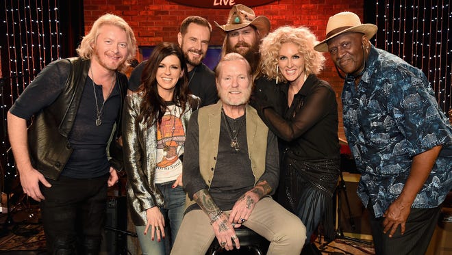 Gregg Allman poses with (Back L-R)  Philip Sweet and Jimi Westbrook of Little Big Town, Chris Stapleton, and  Taj Mahal, (Front L-R) Karen Fairchild of Little Big Town,and Kimberly Schlapman of Little Big Town during the Skyville Live & USA TODAY Presents A Salute to Gregg Allman event on Dec. 11, 2015 in Nashville, Tenn.