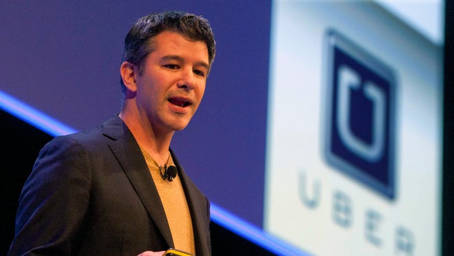 Former Uber CEO Travis Kalanick delivers a speech in London on October 3, 2014.
