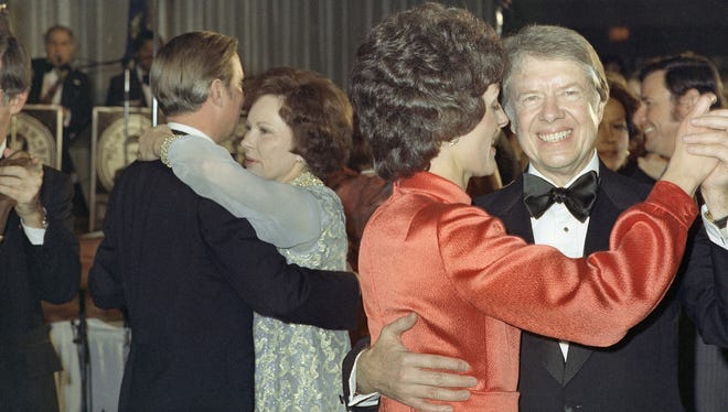 The Carters dance alongside the Mondales in the White House following the 1977 inauguration.