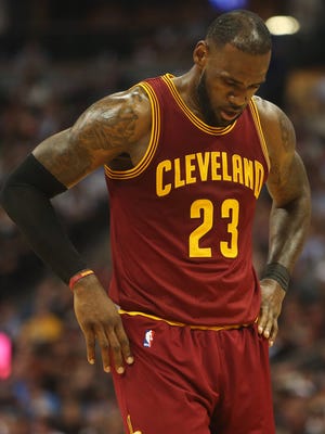 Cleveland Cavaliers forward LeBron James (23) reacts during the second half against the Denver Nuggets at Pepsi Center.
