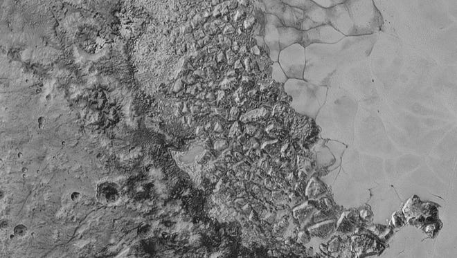 In the center of this 300-mile (470-kilometer) wide image of Pluto from NASA’s New Horizons spacecraft is a large region of jumbled, broken terrain on the northwestern edge of the vast, icy plain informally called Sputnik Planum, to the right. The smallest visible features are 0.5 miles (0.8 kilometers) in size. This image was taken as New Horizons flew past Pluto on July 14, 2015, from a distance of 50,000 miles (80,000 kilometers).