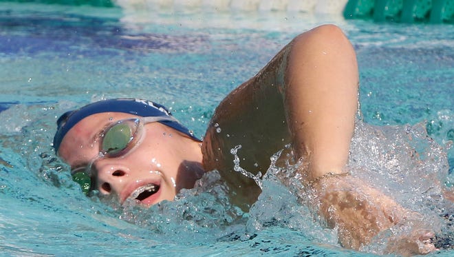 Whitnall's Tegan Klass swims the 400-meter freestyle during the Whitnall Falcon FunFest Invitational on Aug. 19 at the Village Club in Greendale, the season's only outdoor swim meet.