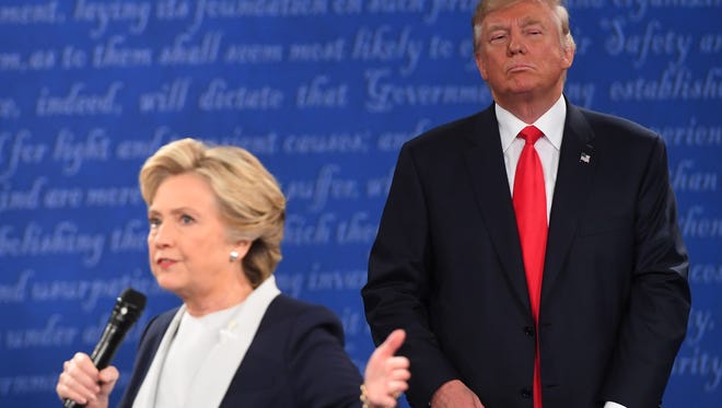 Democratic presidential candidate Hillary Clinton and Republican presidential candidate Donald Trump participate in the second presidential debate at Washington University in St Louis.