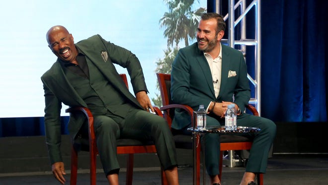 Host/executive producer Steve Harvey, left, and executive producer Shane Farley participate in the 'Steve' panel during the NBC Television Critics Association Summer Press Tour at the Beverly Hilton on Thursday.