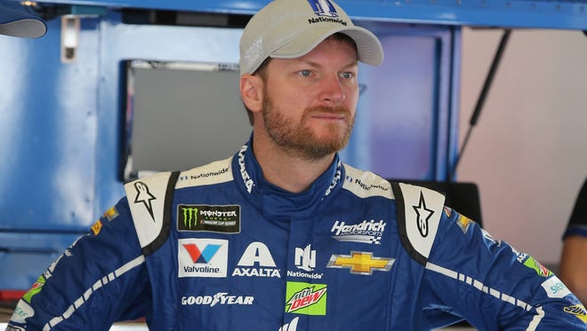 Earnhardt Jr. stands in the garage during practice on Saturday.