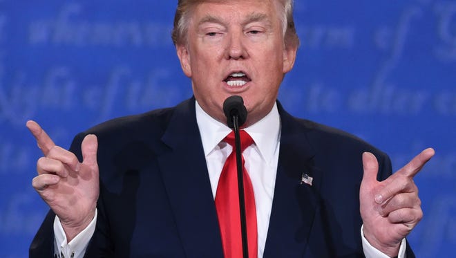 US Republican presidential candidate Donald Trump speaks during the final presidential debate in Las Vegas.
