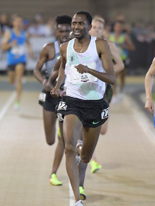 Hassan Mead wins the 10,000 on Thursday in Sacramento to close Day 1 of competition.