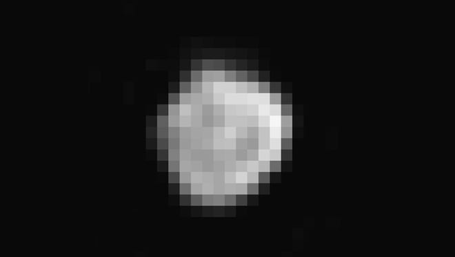 Homing in on Pluto's small satellite Nix, New Horizons' Long Range Reconnaissance Imager captured this image, which shows features as small as 4 miles (6 kilometers across). Mission scientists believe we are looking at one end of an elongated body about 25 miles (40 kilometers) in diameter. The image was acquired on July 13 from a distance of about 360,000 miles (590,000 kilometers).