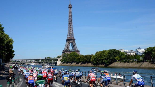A general view as the Tour de France peloton makes its way past the Eiffel Tower.