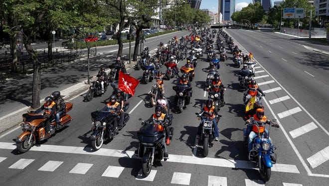 More than 1,500 Harley-Davidson riders take part in a parade in downtown Madrid, Spain, May 13, 2018.