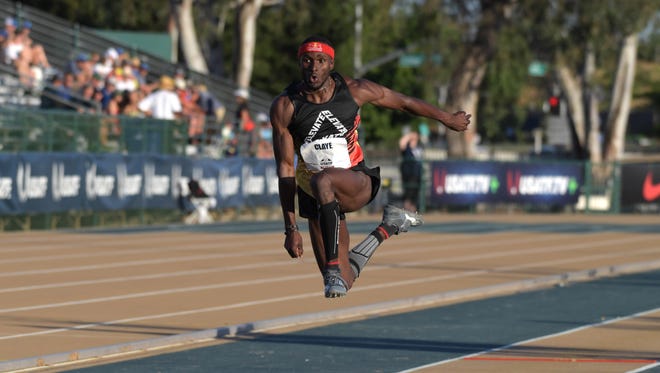 Will Claye wins the triple jump at 58-9 1/4 (17.91m).