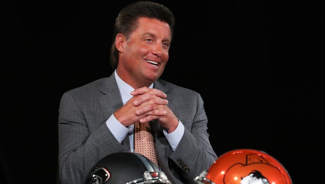 Oklahoma State Cowboys head coach Mike Gundy speaks to the media during the Big 12 Media Days at Omni Dallas Hotel.
