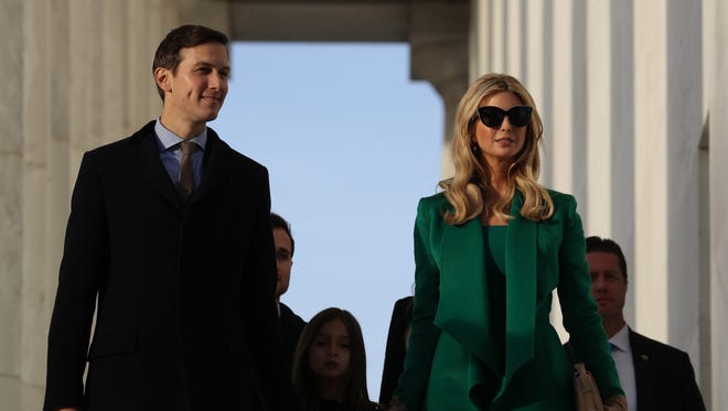 Ivanka Trump (R) and her husband Jared Kushner (L) arrive at the Lincoln Memorial for the 'Make America Great Again! Welcome Celebration.'