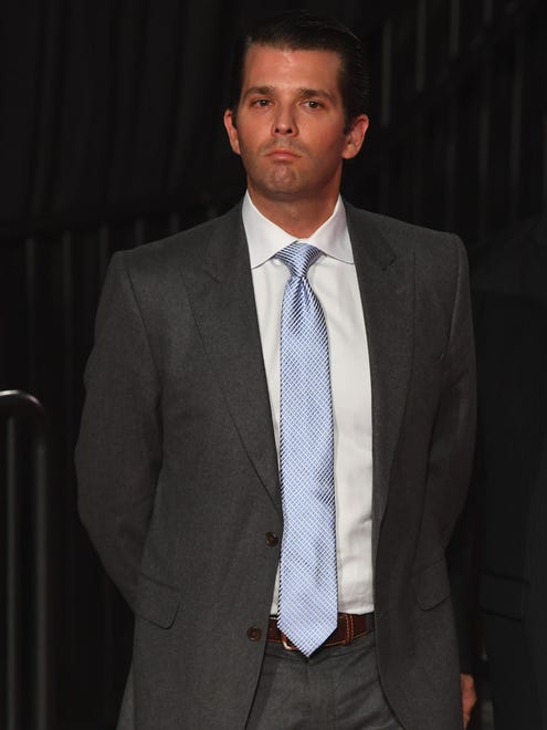 Donald Trump Jr.  walks into the hall at Washington University in St. Louis before the second presidential debate.
