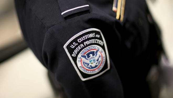A U.S. Customs and Border Protection officer's patch is seen at Miami International Airport in Miami, Florida.